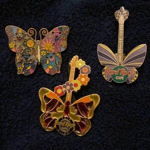 3 butterfly pins.